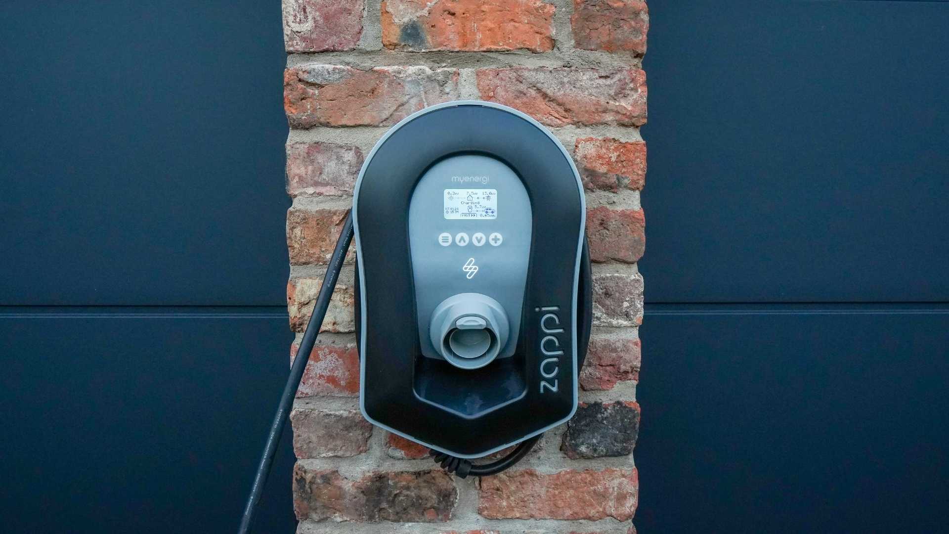 Zappi home EV charger installed on a residential wall